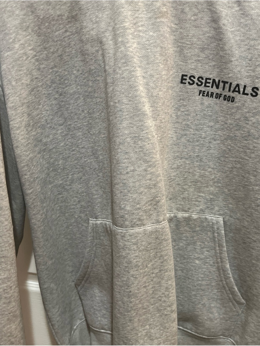 Essentials Men’s Zip-Up Hoodie in Light Gray with Black Logo